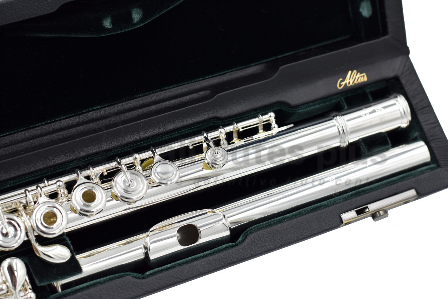 Altus A10REO Flute set in an open case with green velvet interior, close up of headjoint and body joint