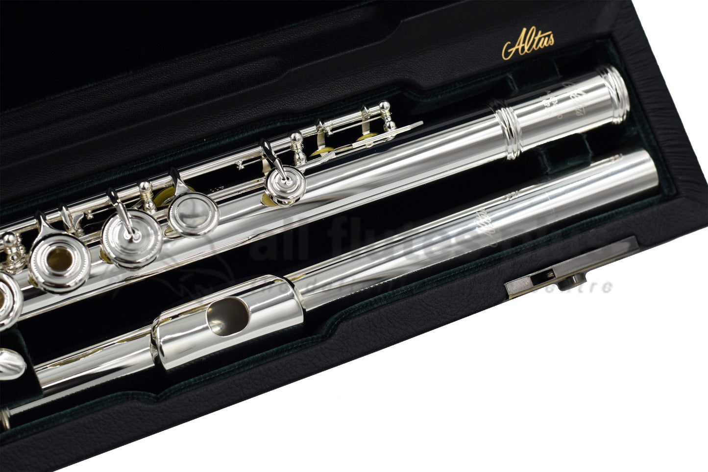 Altus A11 REO Flute set in an open case, close up of headjoint and right hand of body joint 