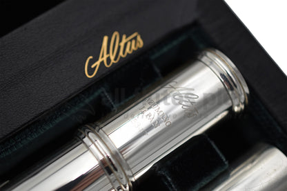 Altus A12 Flute set in an open case, close up of Altus logo on body joint 
