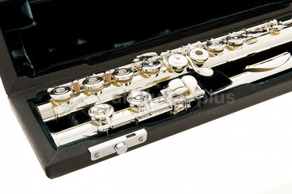 Azumi AZ2E Flute set in an open case with green velvet interior, close up of footjoint and body joint keywork 