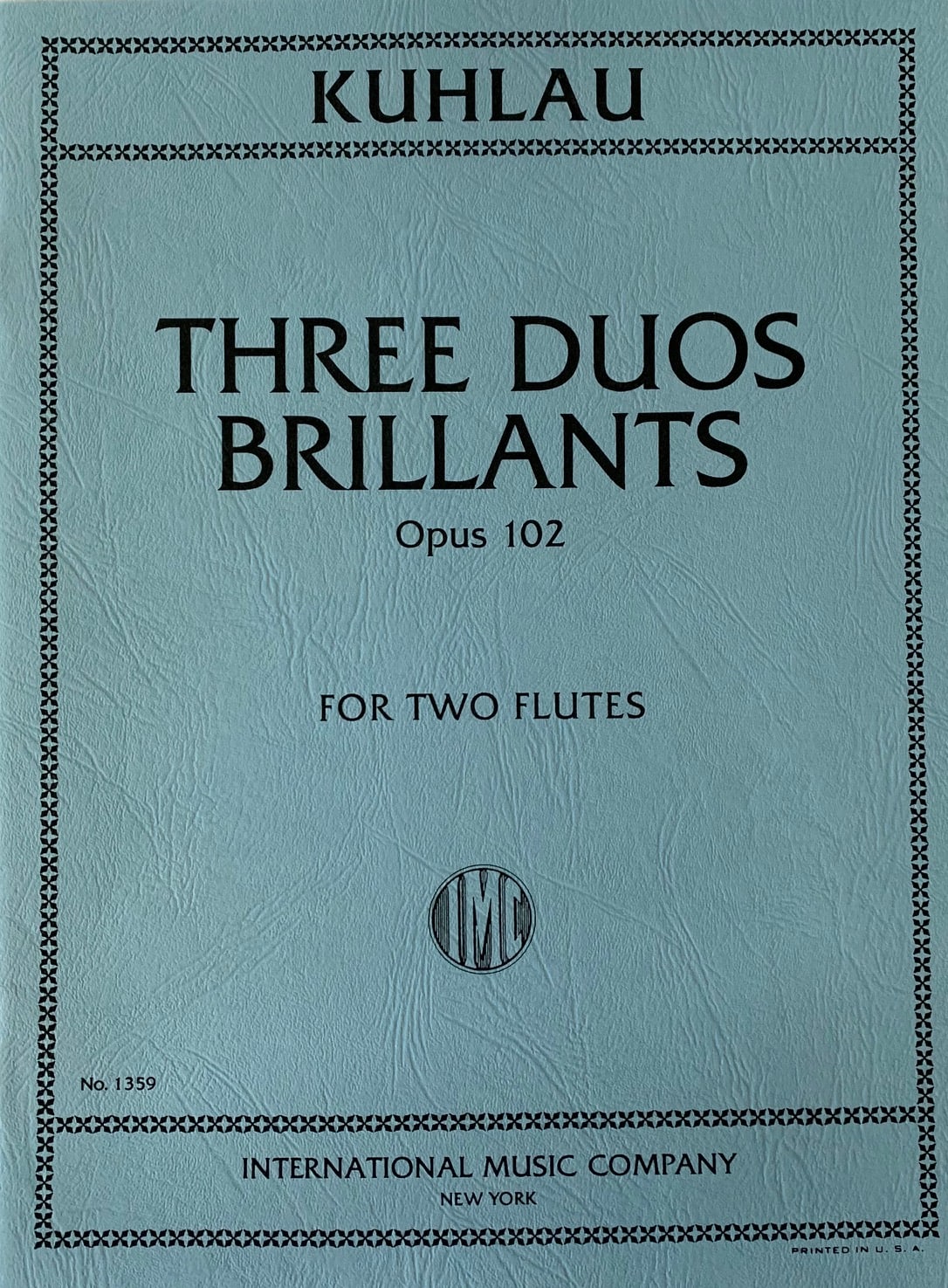 Music sheet cover for 'Three Duos Brillants' by Kuhlau with International Music Company branding.