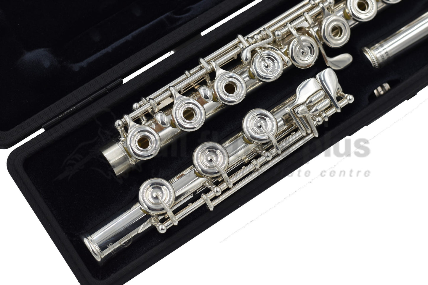 Burkart Elite flute set in an open case, close up of B footjoint and right hand keywork on body joint 