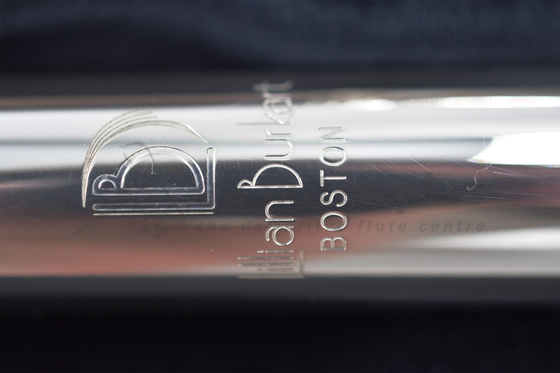 Burkart Elite flute close up of Lillian Burkart Boston logo and serial number on headjoint