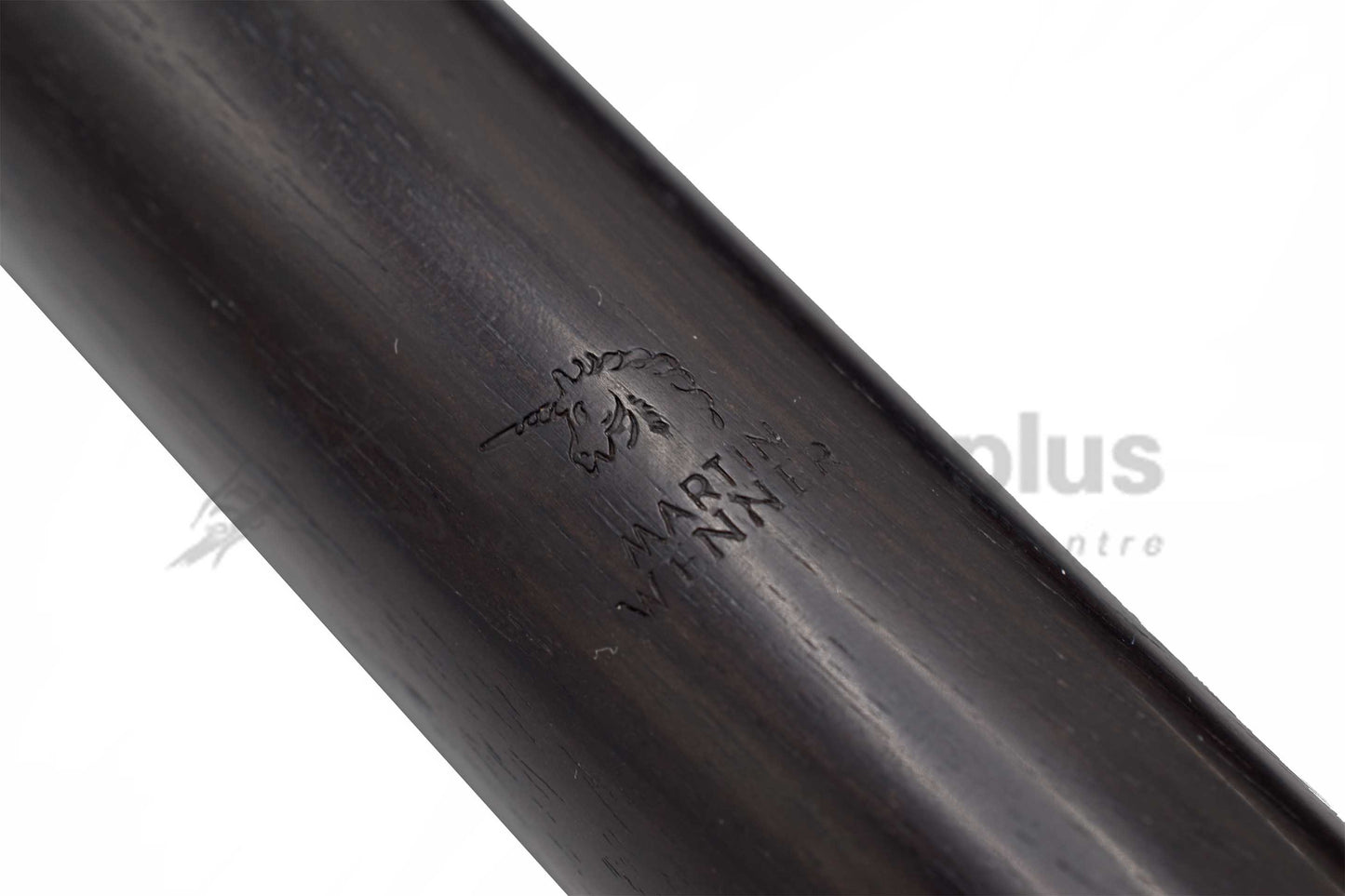 Close up of Martin Wenner brand logo of unicorn on wooden baroque flute