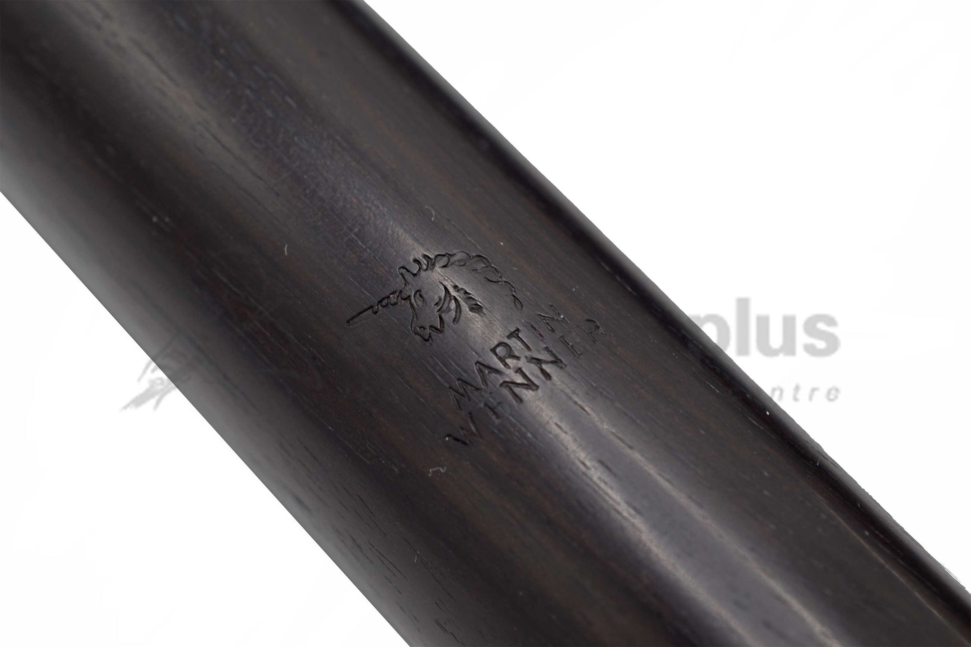 Close up of Martin Wenner brand logo of unicorn on wooden baroque flute