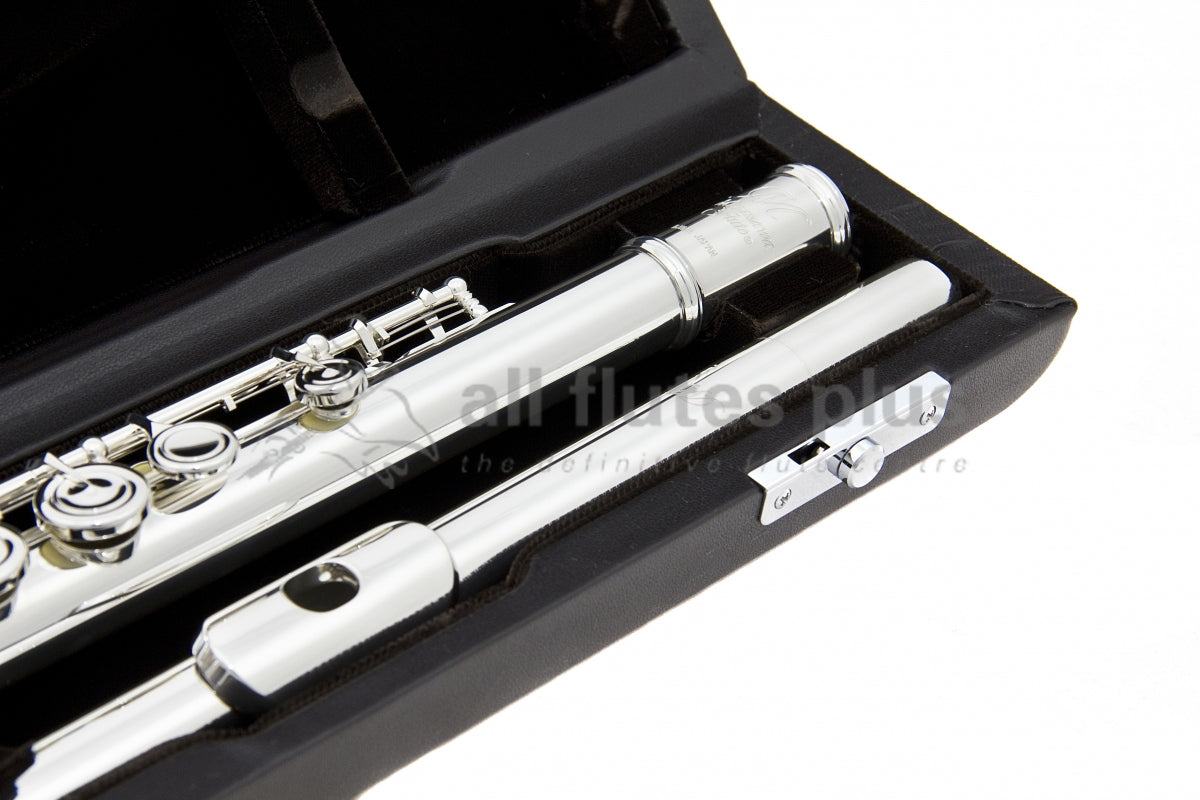 Close up of Miyazawa 602 headjoint lying in black velvet lined case.
