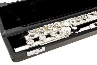 Close up of Miyazawa BR958 - 1 Type 1 flute b footjoint lying in black velvet lined case