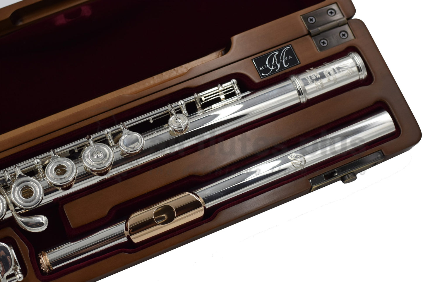 Close up of Miyazawa CS - B Flute Headjoint with a 14K Gold Lip Plate and Riser in a Cherrywood Headcase with red velvet lining