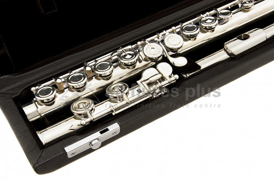 Close-up of a Miyazawa PB102 flute within an open case, showcasing the silver-plated body, keys, and tone holes.