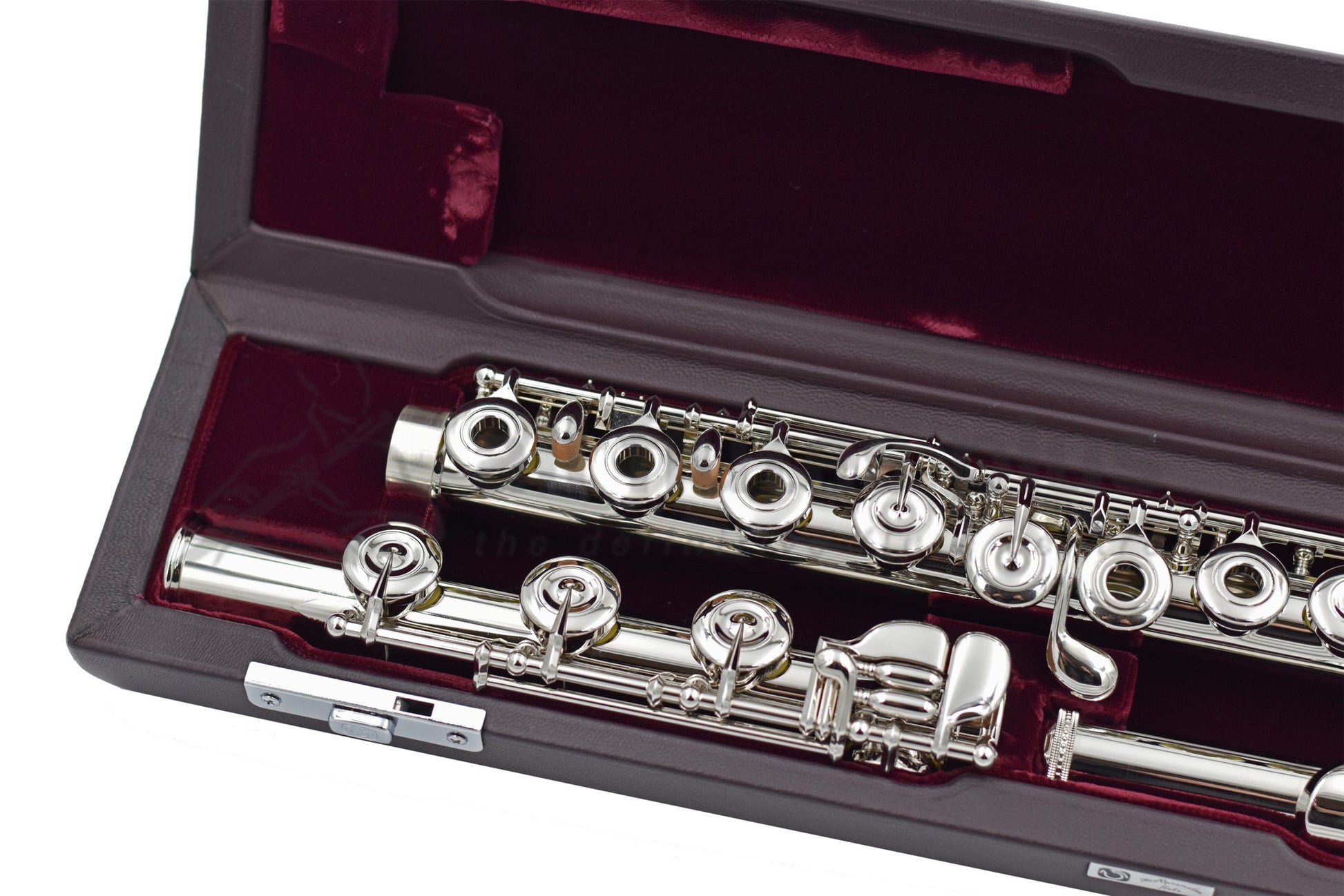 The footjoint and right hand mechanism of the Muramatsu PTP flute lying in its case