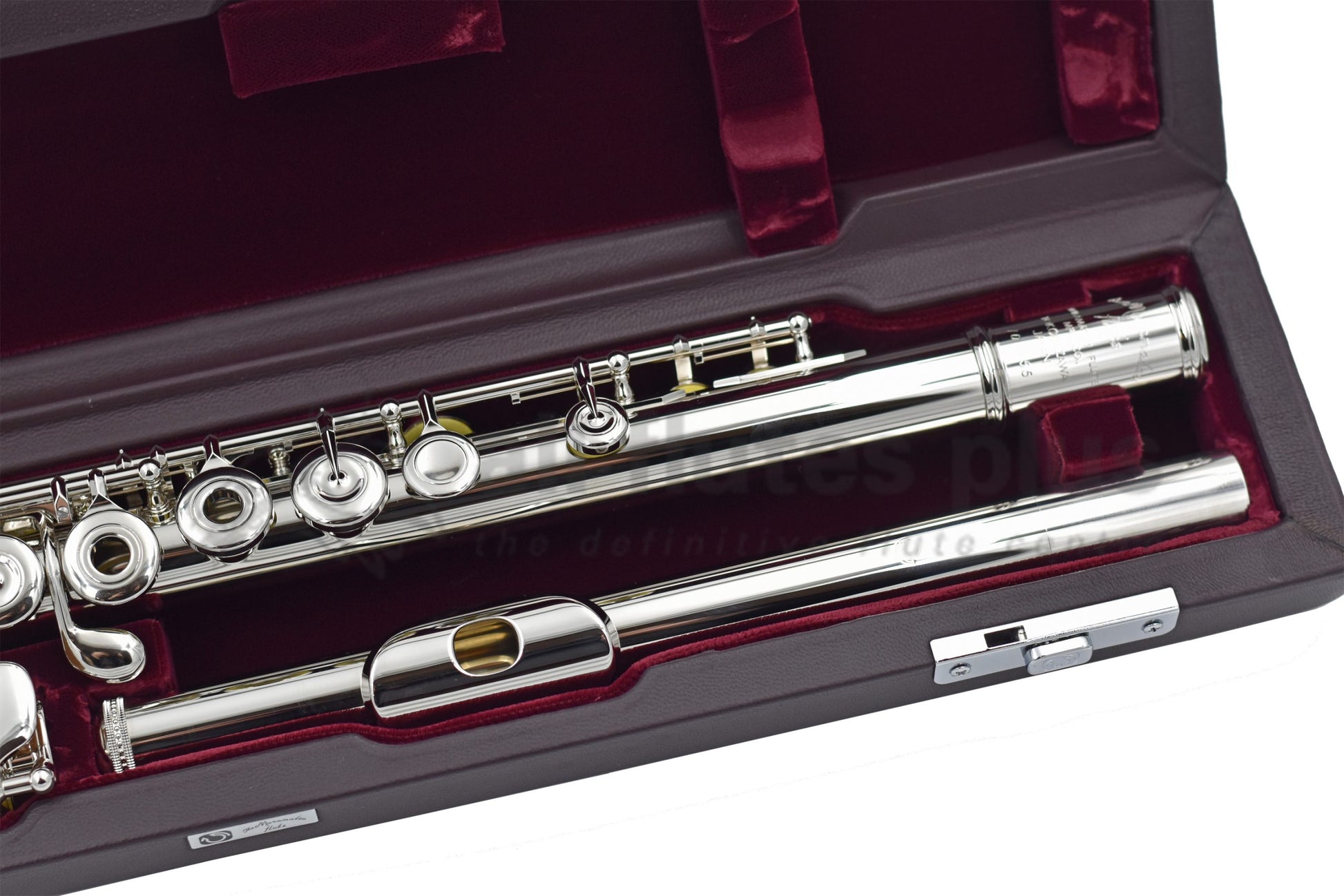 The headjoint and left hand mechanism of the Muramatsu PTP flute lying in its hard case