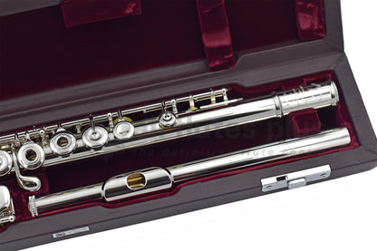 The headjoint and left hand mechanism of the Muramatsu PTP flute lying in its hard case