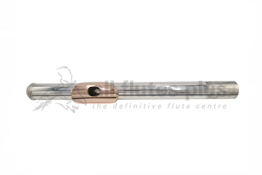 A Nagahara 950 Silver Headjoint with a 10k Gold Lip-plate and an 18k White Gold Riser