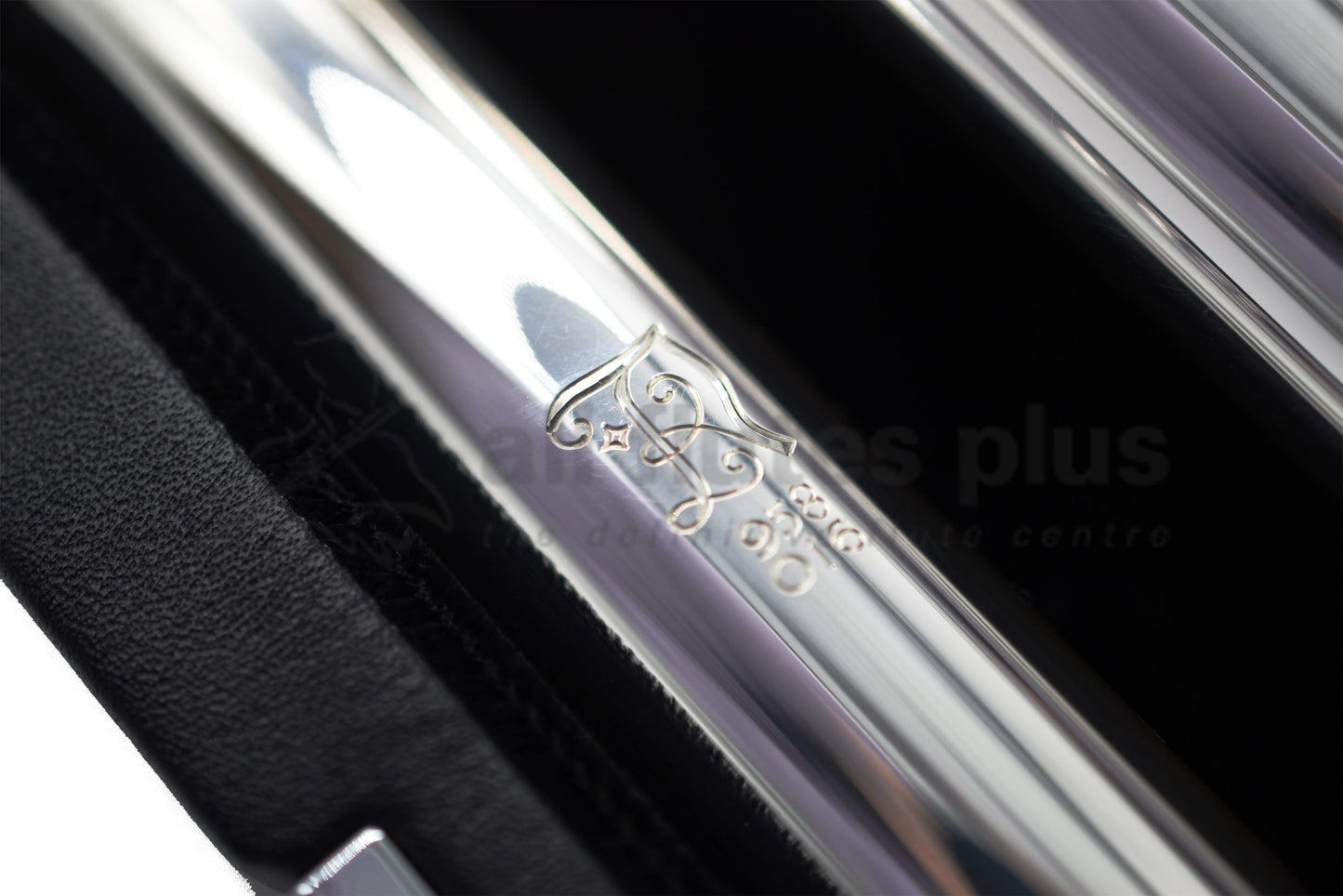 Close up of Nagahara engraving on headjoint set in the flute case, showing numbers 958 and 016
