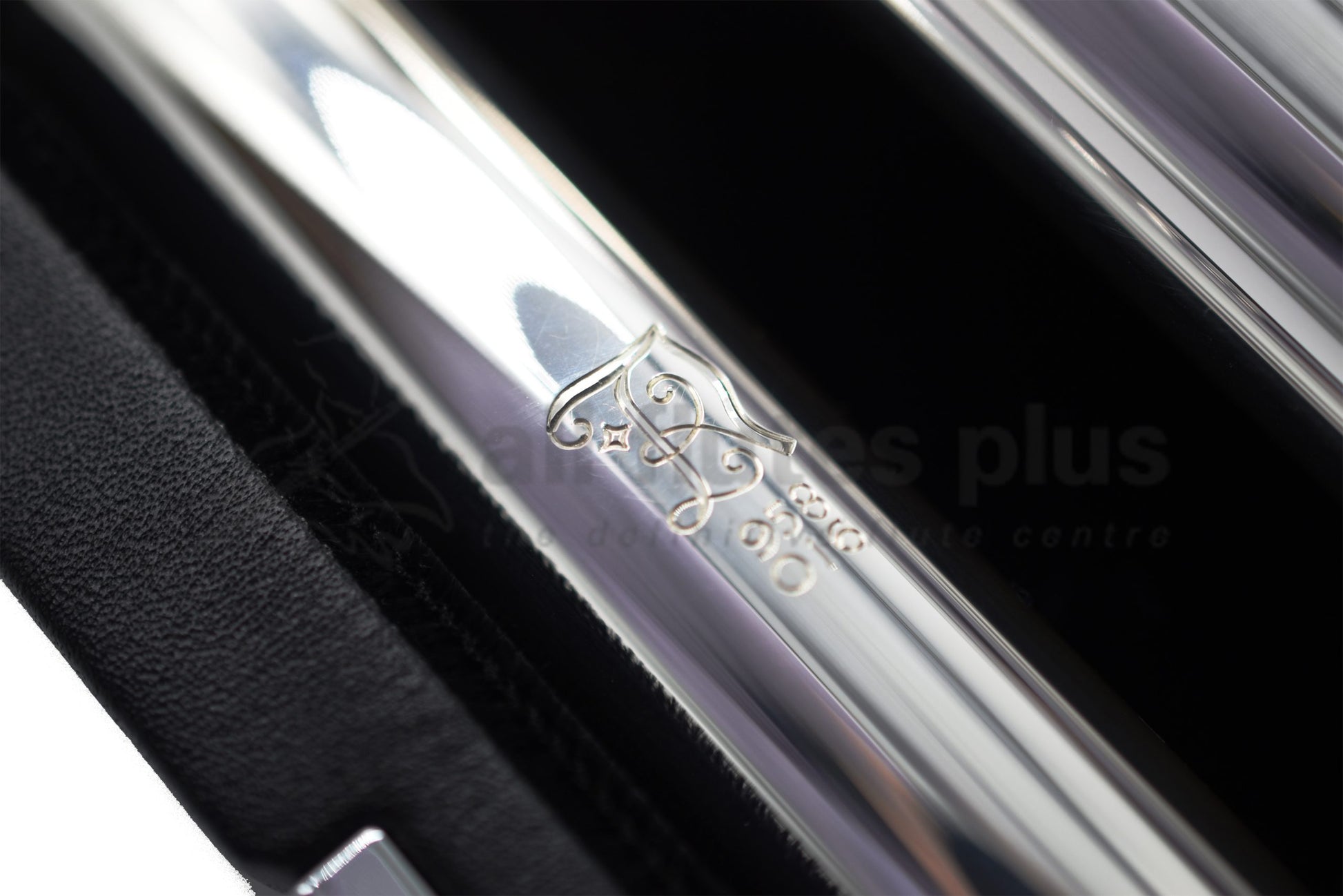 Close up of Nagahara engraving on headjoint set in the flute case, showing numbers 958 and 016