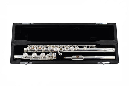 Nagahara Handmade Flute with 14K gold riser lying in a leather bound hard case with black velvet lining