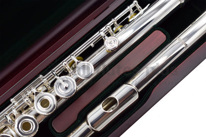 Close up of Pearl PF 695RE Flute set in a cherrywood open case showing headjoint and left hand keywork