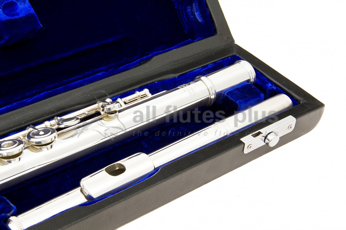 Powell handmade conservatory silver flute close up of headjoint, left hand body tube and keywork, displayed in its open flute case