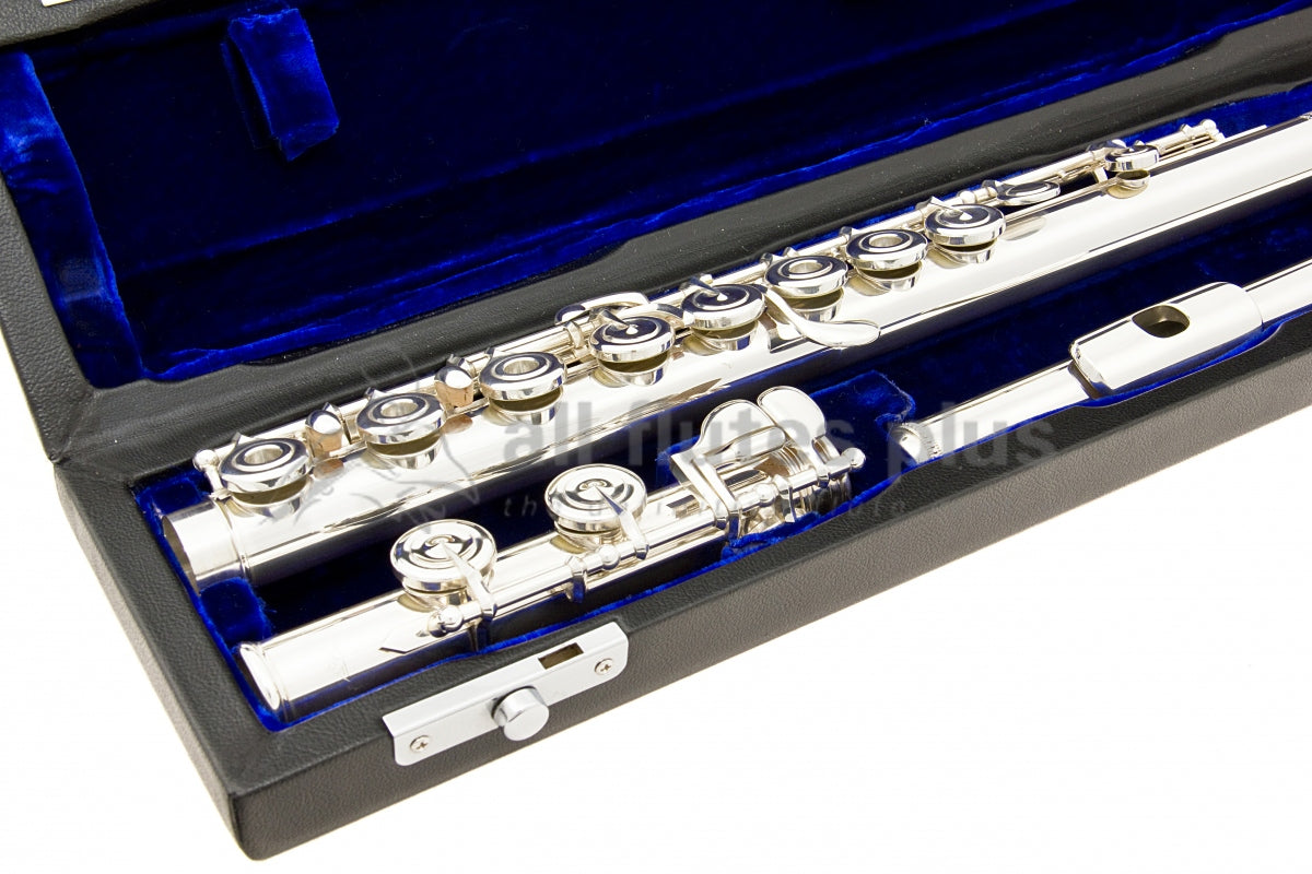 Powell handmade conservatory silver flute close up of right hand open hole keywork, body tube and footjoint mechanism, displayed in its open flute case  