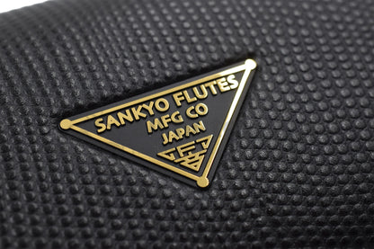 Close up of triangular Sankyo flute logo on hard case 