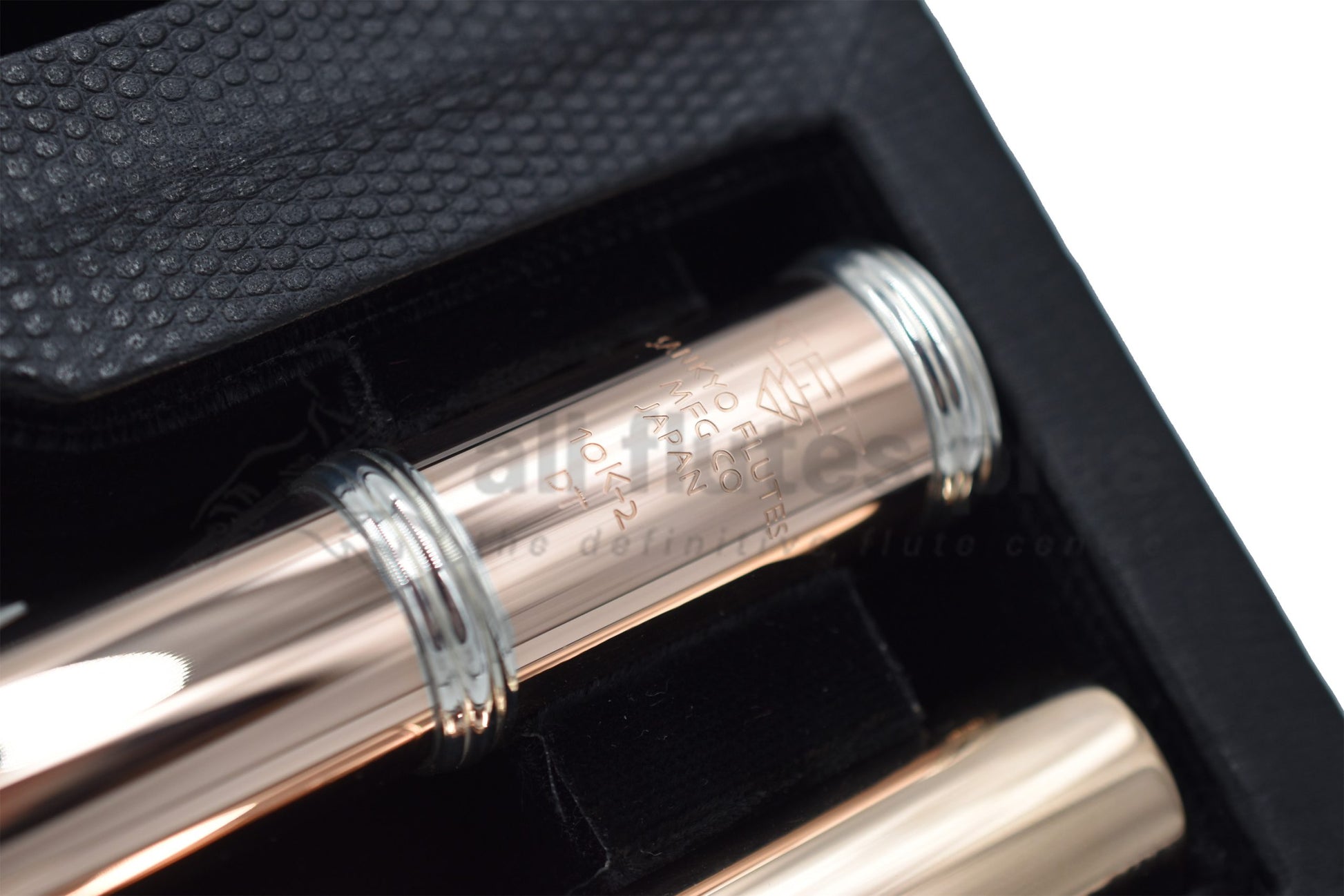 Close up of Sankyo 10K-2 gold flute engraving on body tube