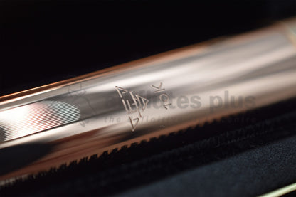 Close up of Sankyo 10K-2 gold flute engraving on headjoint