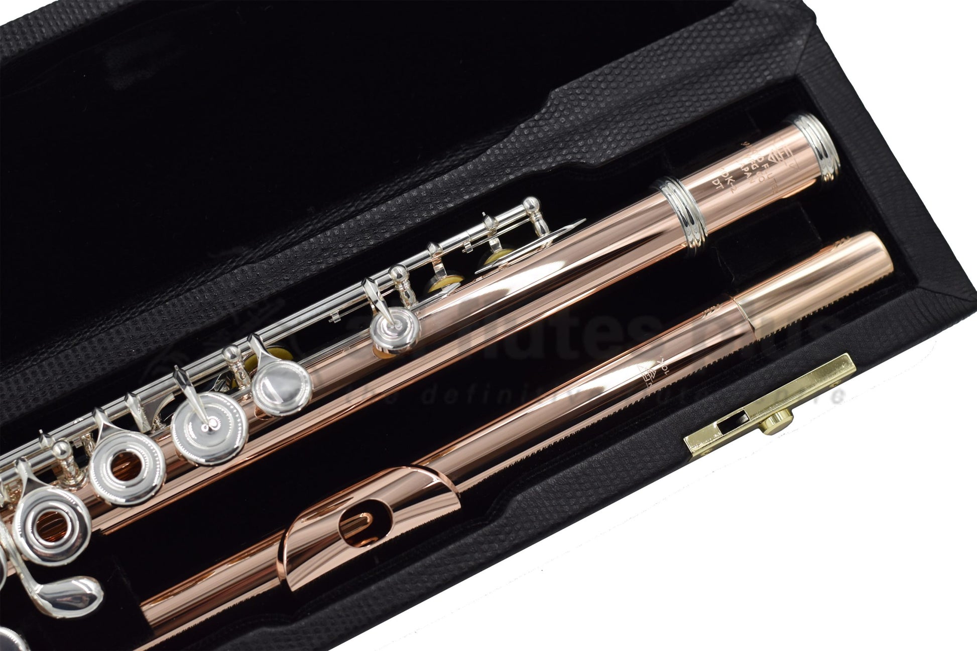 Sankyo 10K-2 gold flute close up of headjoint, left hand body tube and keywork, displayed in its open flute case
