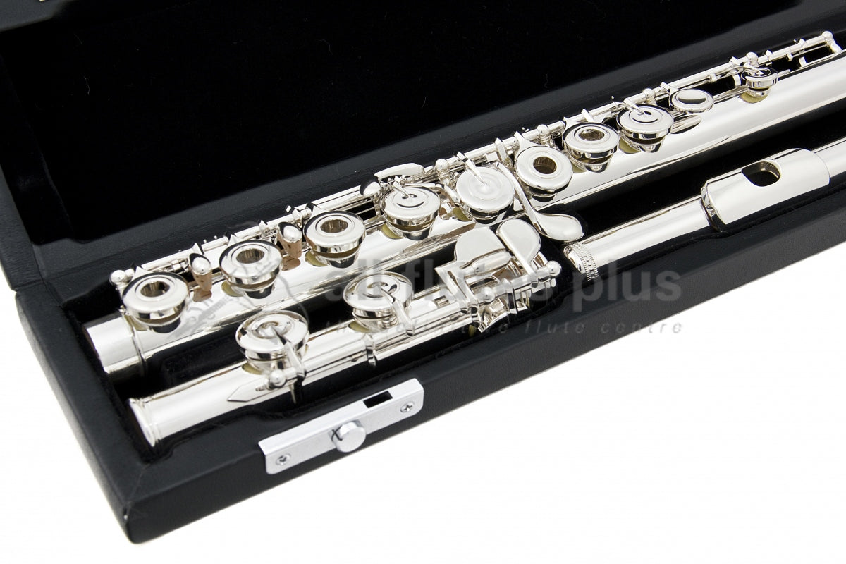Sankyo CF501 flute close up of right hand open hole keywork, body tube and C footjoint mechanism, displayed in its open flute case  