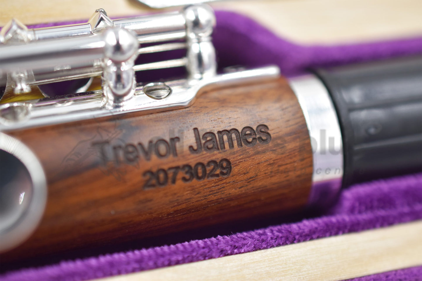 Trevor James Mopane wood piccolo close up of engraving on the body tube