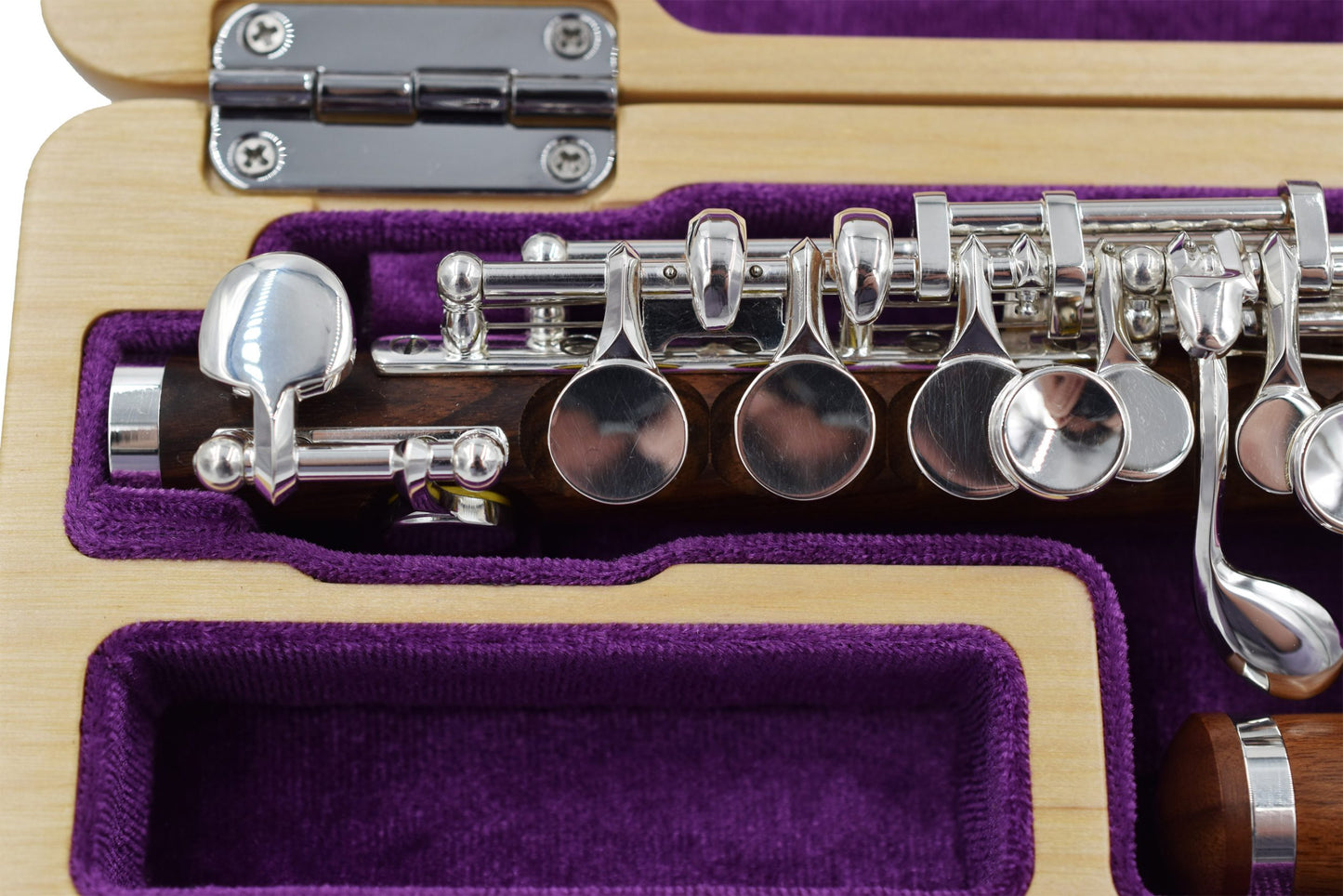 Trevor James Mopane Wood Piccolo close up of right hand keywork and mechanism displayed in its open flute case 
