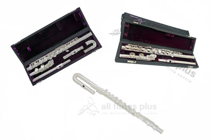 Trevor James performers Alto flute series. Three displays of flute. Top left: straight and curved headjoint option displayed in its open flute case. Top right: straight headjoint option displayed in its open flute case. Middle underneath the flutes in case: flute with curved headjoint put together