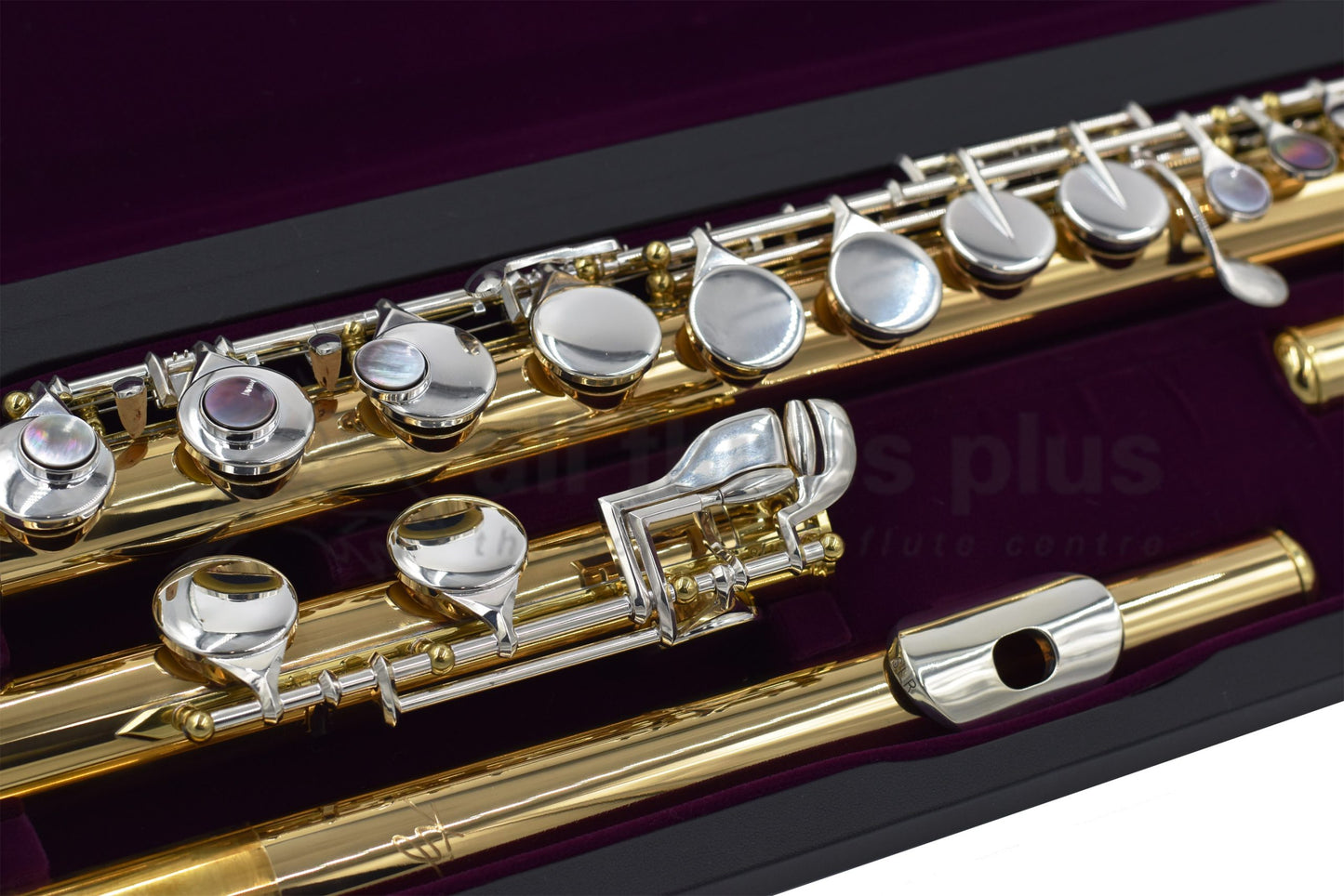 Trevor James Performers Copper Alto flute close up of straight headjoint, right hand keywork, body tube and C footjoint mechanism, displayed in its open flute case  