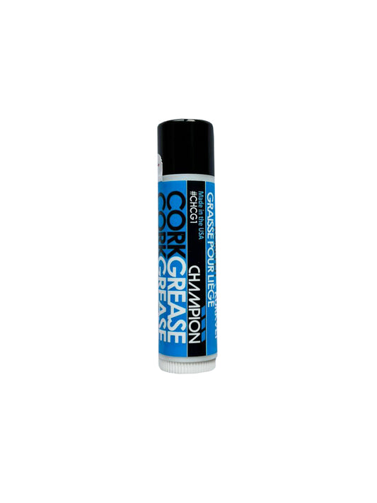Cork grease can with blue label on a white background